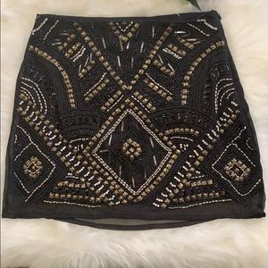 Embellished black mini skirt